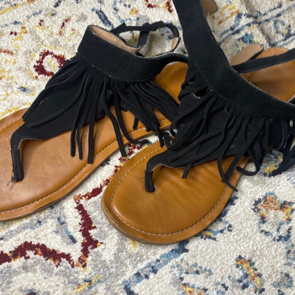 Black fringe sandals